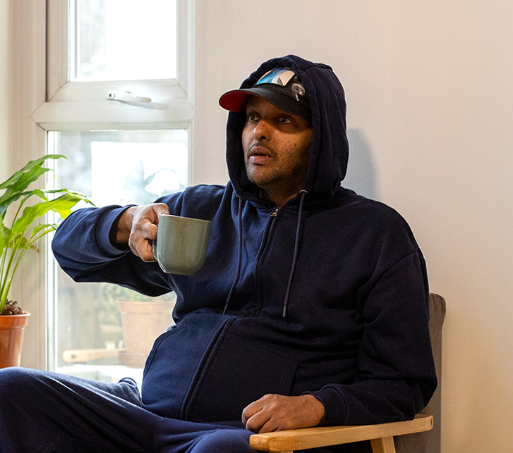 Service user having a cup of tea