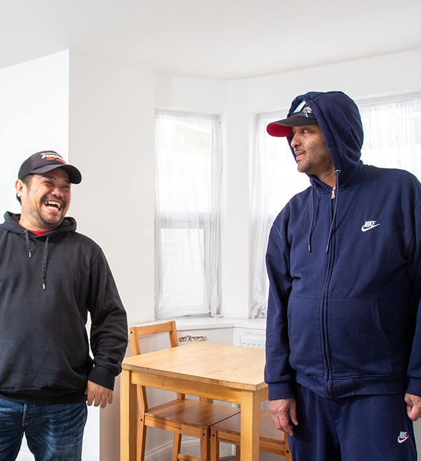 Service user in conversation with his support worker